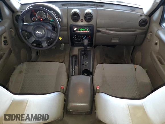 2005 Jeep Liberty Sport with VIN 1J4GK48K45W664323, listed as a Copart auction lot 53851855 with 323,695 mi miles and Salvage Title. Bid and sale history available at DreamBid. Image 8.