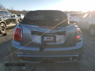 2017 MINI Convertible Cooper S z VIN WMWWG9C3XH3C80939, wystawiony jako Copart lot #85094484 z przebiegiem 56 731 mil mil oraz Szkoda całkowita • Salvage title. Historia ofert i sprzedaży dostępna na DreamBid. Obrazek 6.