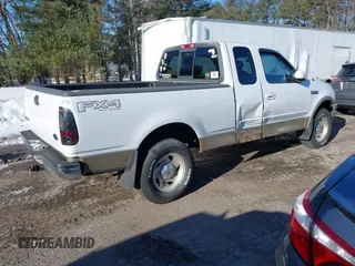 2000 Ford F-150 XL with VIN 1FTRX18W9YNB14241, listed as a IAAI auction lot 41494972 with Not provided miles and . Bid and sale history available at DreamBid. Image 4.