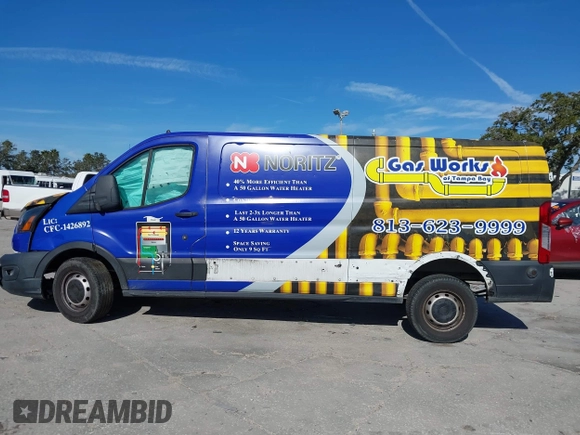 2020 Ford Transit Cargo with VIN 1FTBR1Y82LKB30997, listed as a IAAI auction lot 41293464 with 119,934 mi miles and . Bid and sale history available at DreamBid. Image 14.