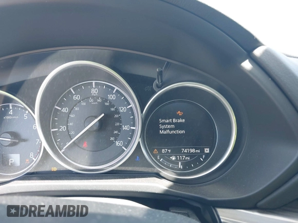 2017 Mazda CX-5 Grand Touring with VIN JM3KFADL6H0217850, listed as a IAAI auction lot 42033404 with 74,198 mi miles and . Bid and sale history available at carsss.com. Image 7.