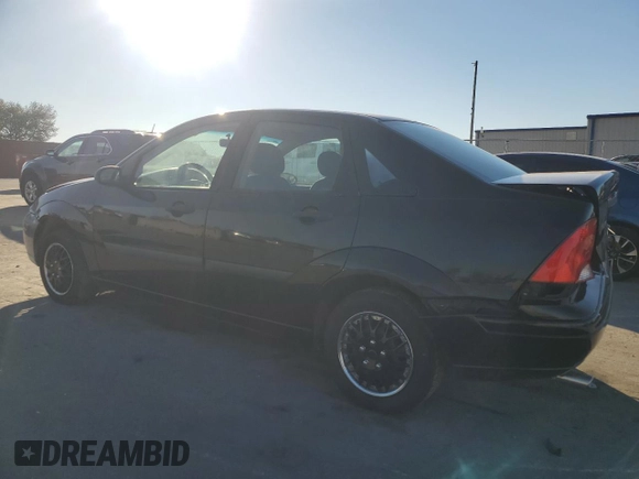 2000 Ford Focus LX with VIN 1FAFP33P8YW216936, listed as a Copart auction lot 83038404 with 120,298 mi miles and Salvage Title. Bid and sale history available at DreamBid. Image 2.