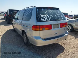 2004 Honda Odyssey EX-L with VIN 5FNRL18904B080009, listed as a IAAI auction lot 41736651 with 461,326 mi miles and . Bid and sale history available at DreamBid. Image 3.