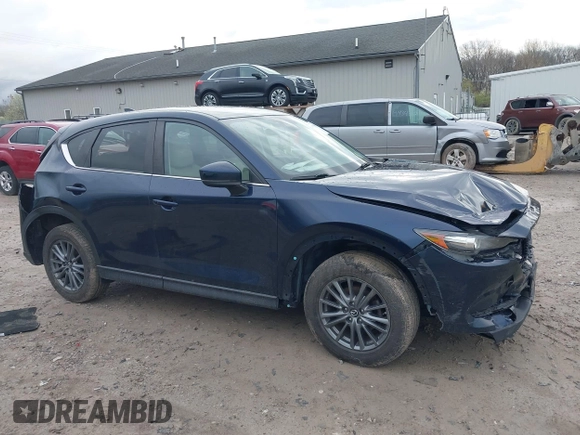 2017 Mazda CX-5 Touring with VIN JM3KFBCL7H0120552, listed as a IAAI auction lot 41953685 with 88,416 mi miles. Bid and sale history available at carsss.com. Image 14.