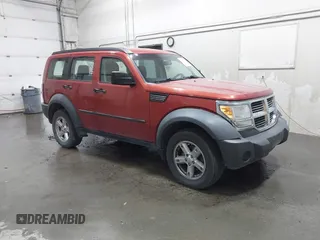 2008 Dodge Nitro SXT z VIN 1D8GU28K58W167212, wystawiony jako IAAI lot #42356214 z przebiegiem 133 455 mil mil oraz . Historia ofert i sprzedaży dostępna na DreamBid. Obrazek 1.