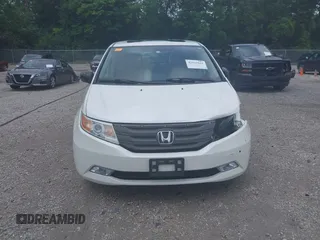 2013 Honda Odyssey Touring with VIN 5FNRL5H9XDB049390, listed as a IAAI auction lot 42532861 with 129,376 mi miles and . Bid and sale history available at DreamBid. Image 13.