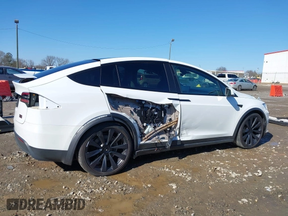 2022 Tesla Model X Plaid z VIN 7SAXCBE64NF352928, wystawiony jako IAAI lot #41406070 z przebiegiem 38 175 mil mil oraz . Historia ofert i sprzedaży dostępna na DreamBid. Obrazek 14.