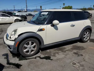 2009 MINI Cooper Hardtop with VIN WMWMF33519TW78662, listed as a Copart auction lot 50433235 with 135,310 mi miles and Salvage Title. Bid and sale history available at carsss.com. Image 1.