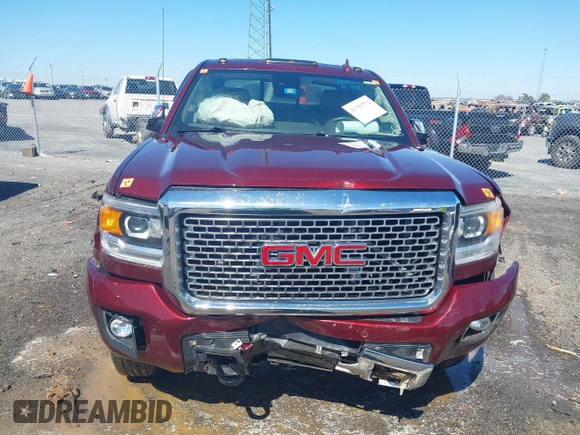 2016 GMC Sierra 2500HD Denali z VIN 1GT12UE87GF287056, wystawiony jako IAAI lot #41753772 z przebiegiem 284 546 mil mil oraz . Historia ofert i sprzedaży dostępna na DreamBid. Obrazek 6.