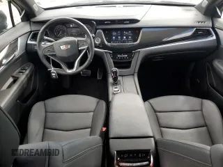2024 Cadillac XT6 AWD Sport z VIN 1GYKPGRS6RZ749292, wystawiony jako Copart lot #50844795 z przebiegiem 12 972 mil mil oraz Szkoda całkowita • Salvage title. Historia ofert i sprzedaży dostępna na DreamBid. Obrazek 8.