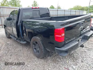 2016 Chevrolet Silverado 1500 LT with VIN 1GCVKREC2GZ323737, listed as a IAAI auction lot 42176512 with 95,385 mi miles and . Bid and sale history available at DreamBid. Image 3.