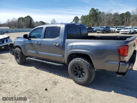 2021 Toyota Tacoma 4WD SR with VIN 5TFCZ5AN6MX252195, listed as a Copart auction lot 48234085 with 56,983 mi miles and Salvage Title. Bid and sale history available at carsss.com. Image 2.