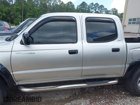 2003 Toyota Tacoma PreRunner z VIN 5TEGN92N23Z218412, wystawiony jako IAAI lot #41994813 z przebiegiem 334 799 mil mil oraz . Historia ofert i sprzedaży dostępna na DreamBid. Obrazek 14.