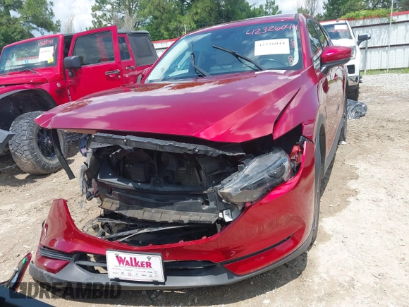 2018 Mazda CX-5 Grand Touring with VIN JM3KFADM4J0335913, listed as a IAAI auction lot 42326044 with 104,583 mi miles and . Bid and sale history available at DreamBid. Image 13.
