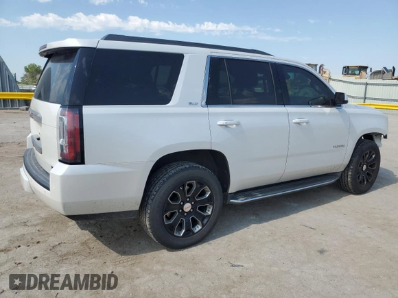 2016 GMC Yukon SLT with VIN 1GKS2BKC2GR253823, listed as a Copart auction lot 62029824 with 98,825 mi miles and Salvage Title. Bid and sale history available at carsss.com. Image 3.