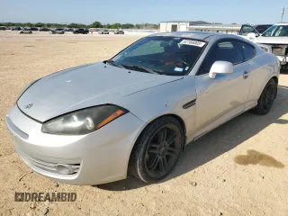 2008 Hyundai Tiburon GT z VIN KMHHN66F28U293287, wystawiony jako Copart lot #52166005 z przebiegiem 106 072 mil mil oraz Czysty tytuł • Clean title. Historia ofert i sprzedaży dostępna na DreamBid. Obrazek 1.