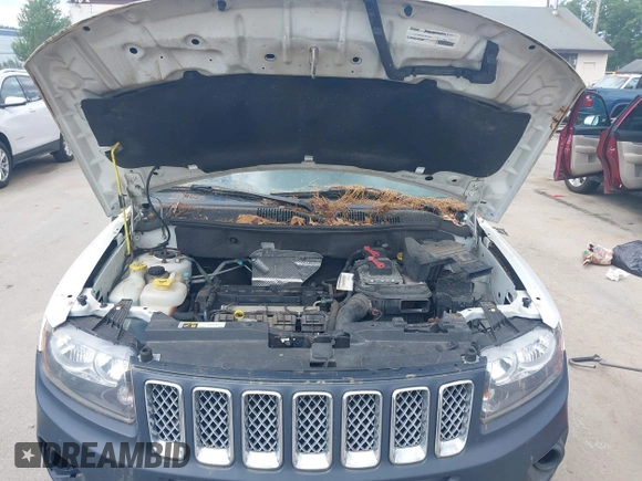 2016 Jeep Compass Latitude z VIN 1C4NJDEB6GD596061, wystawiony jako IAAI lot #42623673 z przebiegiem 180 777 mil mil oraz . Historia ofert i sprzedaży dostępna na DreamBid. Obrazek 10.