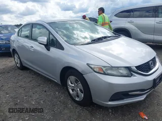 2014 Honda Civic LX z VIN 2HGFB2F59EH551132, wystawiony jako IAAI lot #42253212 z przebiegiem 208 457 mil mil oraz . Historia ofert i sprzedaży dostępna na DreamBid. Obrazek 1.