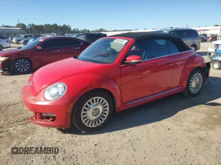2016 Volkswagen Beetle S with VIN 3VW517AT1GM807751, listed as a Copart auction lot 80858404 with 84,104 mi miles and Salvage Title. Bid and sale history available at DreamBid. Image 1.