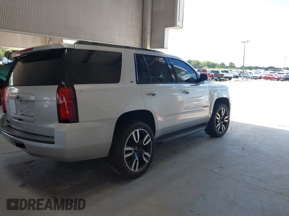 2019 Chevrolet Tahoe LT with VIN 1GNSCBKC0KR240660, listed as a IAAI auction lot 42265044 with 109,720 mi miles and . Bid and sale history available at DreamBid. Image 4.
