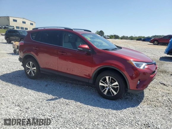 2018 Toyota RAV4 XLE with VIN JTMWFREV7JD119143, listed as a Copart auction lot 52576915 with 56,947 mi miles and Salvage Title. Bid and sale history available at carsss.com. Image 4.