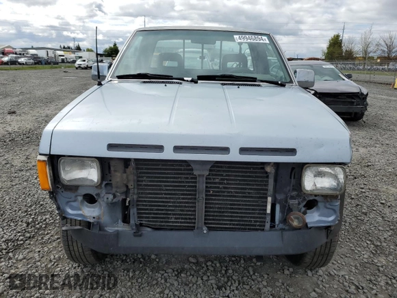 1993 Nissan Frontier SE z VIN 1N6HD16Y0PC408188, wystawiony jako Copart lot #71028394 z przebiegiem 258 939 mil mil oraz Szkoda całkowita • Salvage title. Historia ofert i sprzedaży dostępna na DreamBid. Obrazek 5.