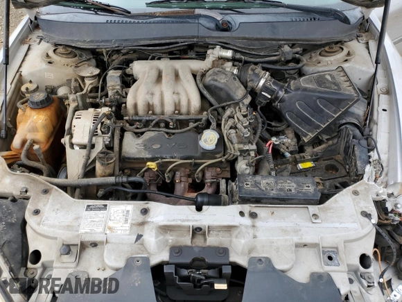 2000 Ford Taurus SE with VIN 1FAFP532XYA141783, listed as a Copart auction lot 43949795 with 203,939 mi miles and Salvage Title. Bid and sale history available at DreamBid. Image 11.