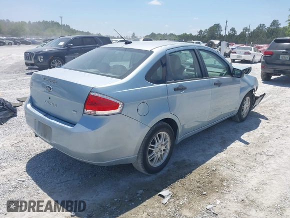 2009 Ford Focus SE with VIN 1FAHP35N19W232918, listed as a IAAI auction lot 42076066 with 165,953 mi miles. Bid and sale history available at carsss.com. Image 4.