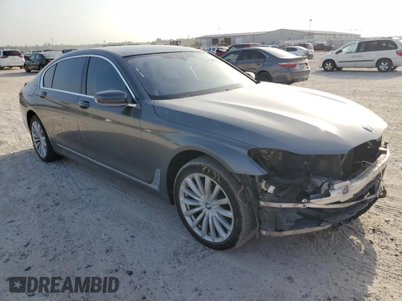 2018 BMW 7 Series 740i with VIN WBA7E2C56JG741634, listed as a Copart auction lot 61530123 with 82,207 mi miles. Bid and sale history available at carsss.com. Image 4.