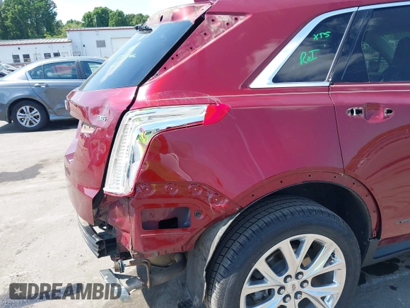 2017 Cadillac XT5 Luxury FWD z VIN 1GYKNBRS3HZ293677, wystawiony jako IAAI lot #42043025 z przebiegiem 89 975 mil mil oraz . Historia ofert i sprzedaży dostępna na DreamBid. Obrazek 18.