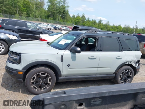 2023 Ford Bronco Sport Outer Banks z VIN 3FMCR9C64PRD05448, wystawiony jako IAAI lot #42375732 z przebiegiem 53 538 mil mil oraz . Historia ofert i sprzedaży dostępna na DreamBid. Obrazek 15.