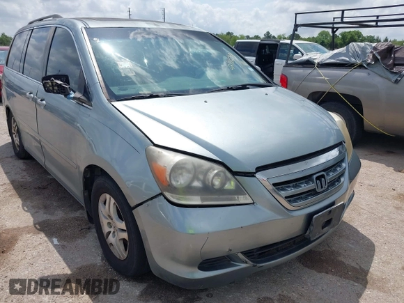 2005 Honda Odyssey EX-L with VIN 5FNRL38735B118506, listed as a IAAI auction lot 42101540 with 159,688 mi miles. Bid and sale history available at carsss.com. Image 1.