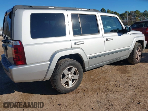 2007 Jeep Commander Sport z VIN 1J8HH48K77C587615, wystawiony jako IAAI lot #41149777 z przebiegiem 167 871 mil mil oraz . Historia ofert i sprzedaży dostępna na DreamBid. Obrazek 4.