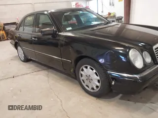 1998 Mercedes-Benz E-Class with VIN WDBJF65F7WA617755, listed as a IAAI auction lot 41737424 with 113,068 mi miles. Bid and sale history available at carsss.com. Image 6.