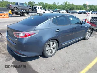 2015 Kia Optima EX z VIN KNAGN4AD8F5084764, wystawiony jako IAAI lot #42404405 z przebiegiem 158 587 mil mil oraz . Historia ofert i sprzedaży dostępna na DreamBid. Obrazek 4.