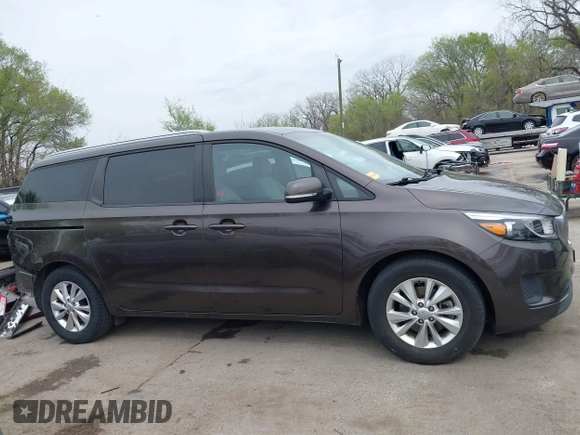 2016 Kia Sedona LX with VIN KNDMB5C17G6093362, listed as a IAAI auction lot 41996581 with 107,160 mi miles and . Bid and sale history available at DreamBid. Image 14.