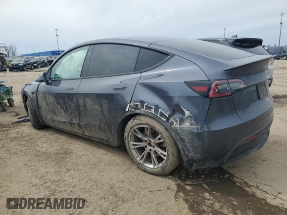 2023 Tesla Model Y Long Range z VIN 7SAYGDEE3PF884220, wystawiony jako Copart lot #52072605 z przebiegiem 44 996 mil mil oraz Czysty tytuł • Clean title. Historia ofert i sprzedaży dostępna na DreamBid. Obrazek 2.