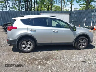 2013 Toyota RAV4 XLE with VIN JTMRFREV6DD011338, listed as a IAAI auction lot 42214088 with 202,537 mi miles and . Bid and sale history available at DreamBid. Image 13.