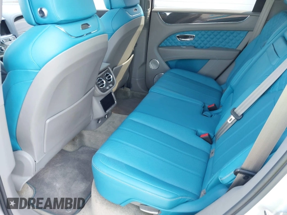 2022 Bentley Bentayga V8 z VIN SJAAM2ZV9NC011752, wystawiony jako IAAI lot #41265000 z przebiegiem Nie podano mil oraz . Historia ofert i sprzedaży dostępna na DreamBid. Obrazek 8.
