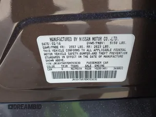 2014 Infiniti Q50 Hybrid Sport with VIN JN1AV7AR7EM703030, listed as a IAAI auction lot 41661844 with 128,202 mi miles. Bid and sale history available at carsss.com. Image 9.