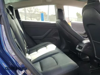 2019 Tesla Model 3 Mid Range with VIN 5YJ3E1EA8KF299456, listed as a Copart auction lot 48152695 with 27,144 mi miles and Salvage Title. Bid and sale history available at DreamBid. Image 10.