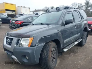 2014 Nissan Xterra X with VIN 5N1AN0NW5EN810488, listed as a IAAI auction lot 41705791 with 127,936 mi miles and . Bid and sale history available at DreamBid. Image 2.