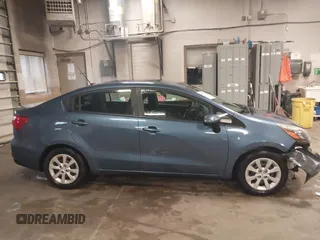 2016 Kia Rio LX with VIN KNADM4A38G6542067, listed as a IAAI auction lot 42057438 with 128,196 mi miles. Bid and sale history available at carsss.com. Image 14.