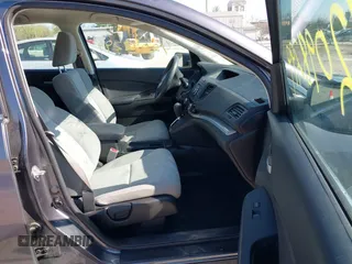 2015 Honda CR-V LX with VIN 2HKRM3H31FH557779, listed as a IAAI auction lot 42098299 with 211,683 mi miles and . Bid and sale history available at carsss.com. Image 5.