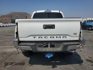 2017 Toyota Tacoma SR5 with VIN 3TMCZ5AN7HM065026, listed as a Copart auction lot 60438365 with 122,329 mi miles and Salvage title. Bid and sale history available at DreamBid. Image 6.