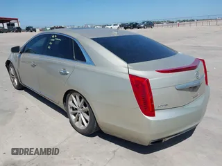 2014 Cadillac XTS Premium with VIN 2G61P5S33E9157607, listed as a IAAI auction lot 42004612 with 111,047 mi miles and . Bid and sale history available at DreamBid. Image 3.