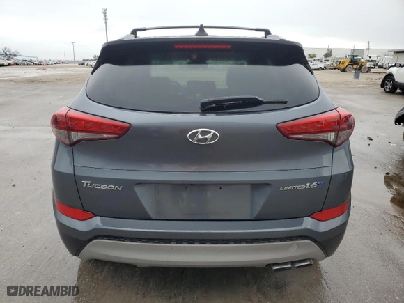 2017 Hyundai Tucson Value with VIN KM8J33A22HU367754, listed as a Copart auction lot 42009495 with 55,477 mi miles and Salvage Title. Bid and sale history available at carsss.com. Image 6.
