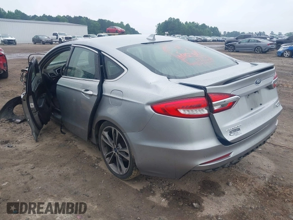 2020 Ford Fusion Titanium with VIN 3FA6P0D99LR138127, listed as a IAAI auction lot 42439024 with 128,792 mi miles and . Bid and sale history available at DreamBid. Image 3.