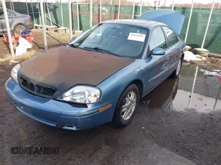 2005 Mercury Sable LS with VIN 1MEFM55S65A611575, listed as a IAAI auction lot 41535836 with 98,932 mi miles and . Bid and sale history available at carsss.com. Image 2.