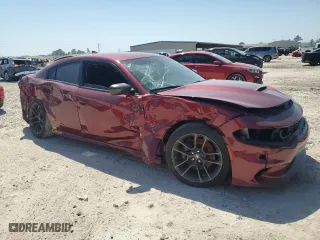 2022 Dodge Charger Scat Pack with VIN 2C3CDXGJ6NH209467, listed as a Copart auction lot 50803735 with 67,389 mi miles and Salvage Title. Bid and sale history available at carsss.com. Image 4.